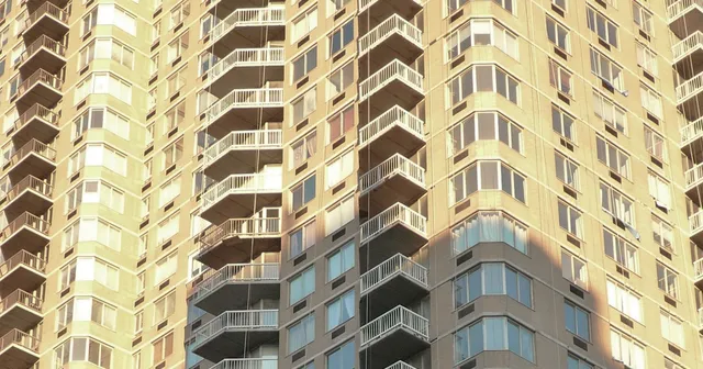 Sunlit balconies on a New York residential high-rise.